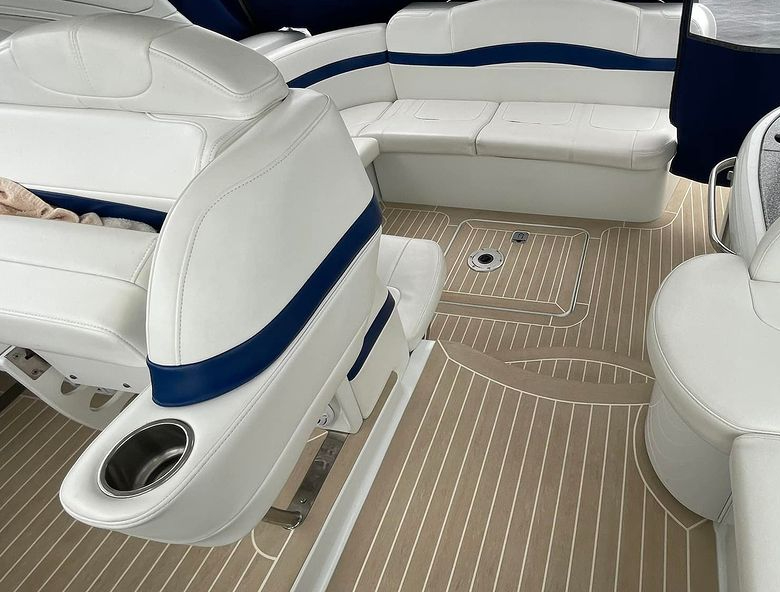 Powerboat cockpit with synthetic teak flooring