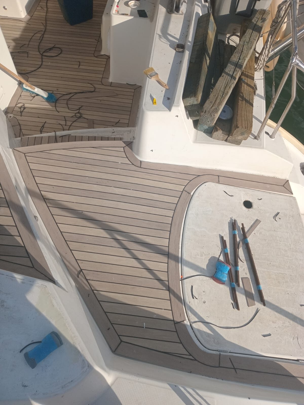 New synthetic teak deck fitted over the rebuilt subfloor