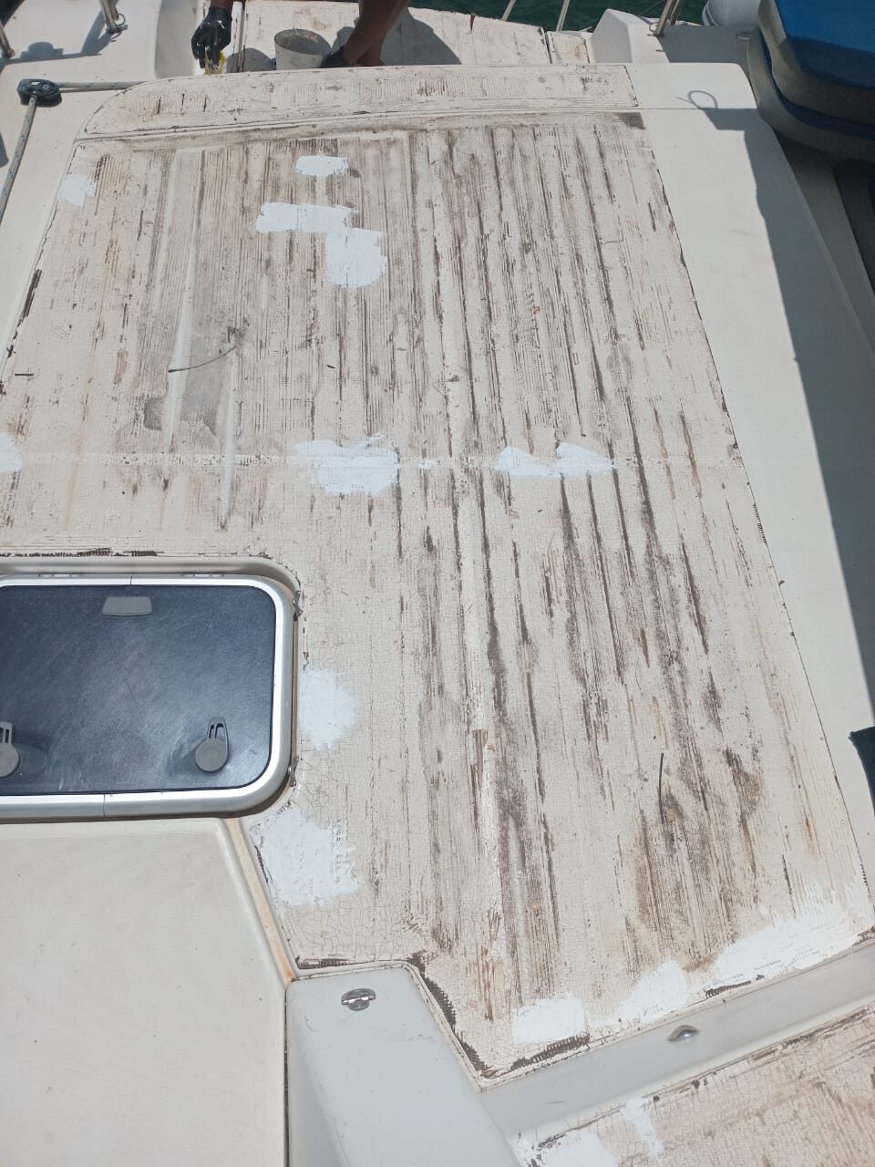 Deck stripped down to the water-damaged subdeck