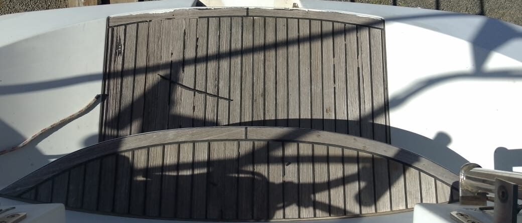 Weathered wooden teak steps before rebuild